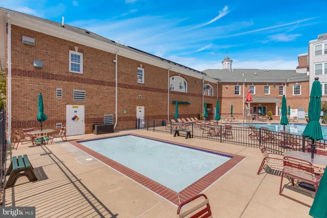 a view of a building with sitting area