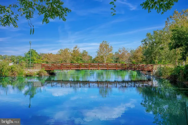 a view of lake with green space