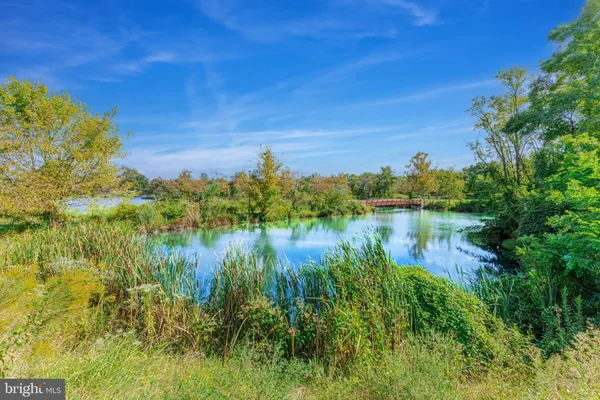 a view of lake with a house