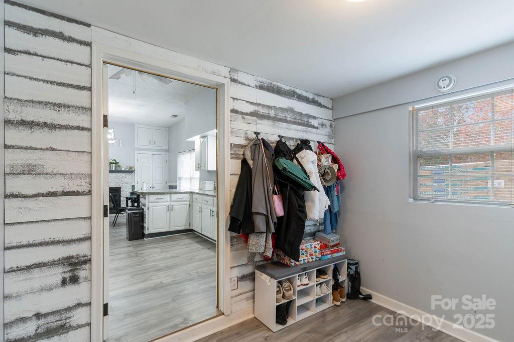 203 Providence Church Road Forest City, NC 28043 - Photo 27 of 46 a view of walk in closet with clothes and shoes