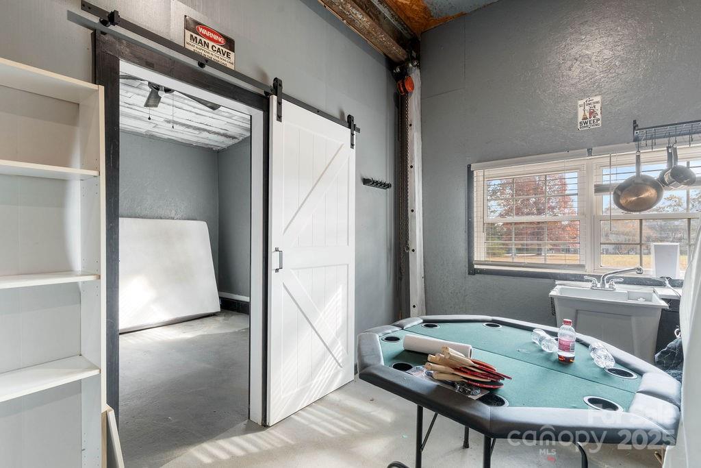 203 Providence Church Road Forest City, NC 28043 - Photo 38 of 46 a room with furniture and window