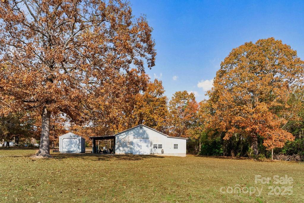 203 Providence Church Road Forest City, NC 28043 - Photo 41 of 46 a view of a house with a yard