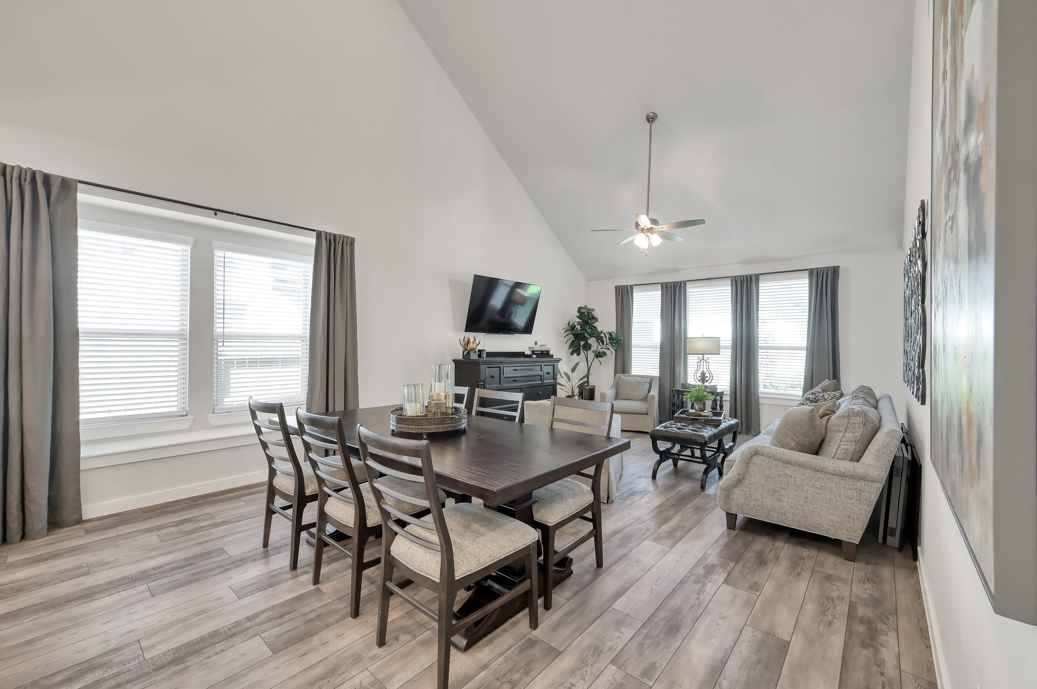 554 Timber Voyage Court Conroe, TX 77304 - Photo 10 of 35 a view of a livingroom with furniture window and wooden floor