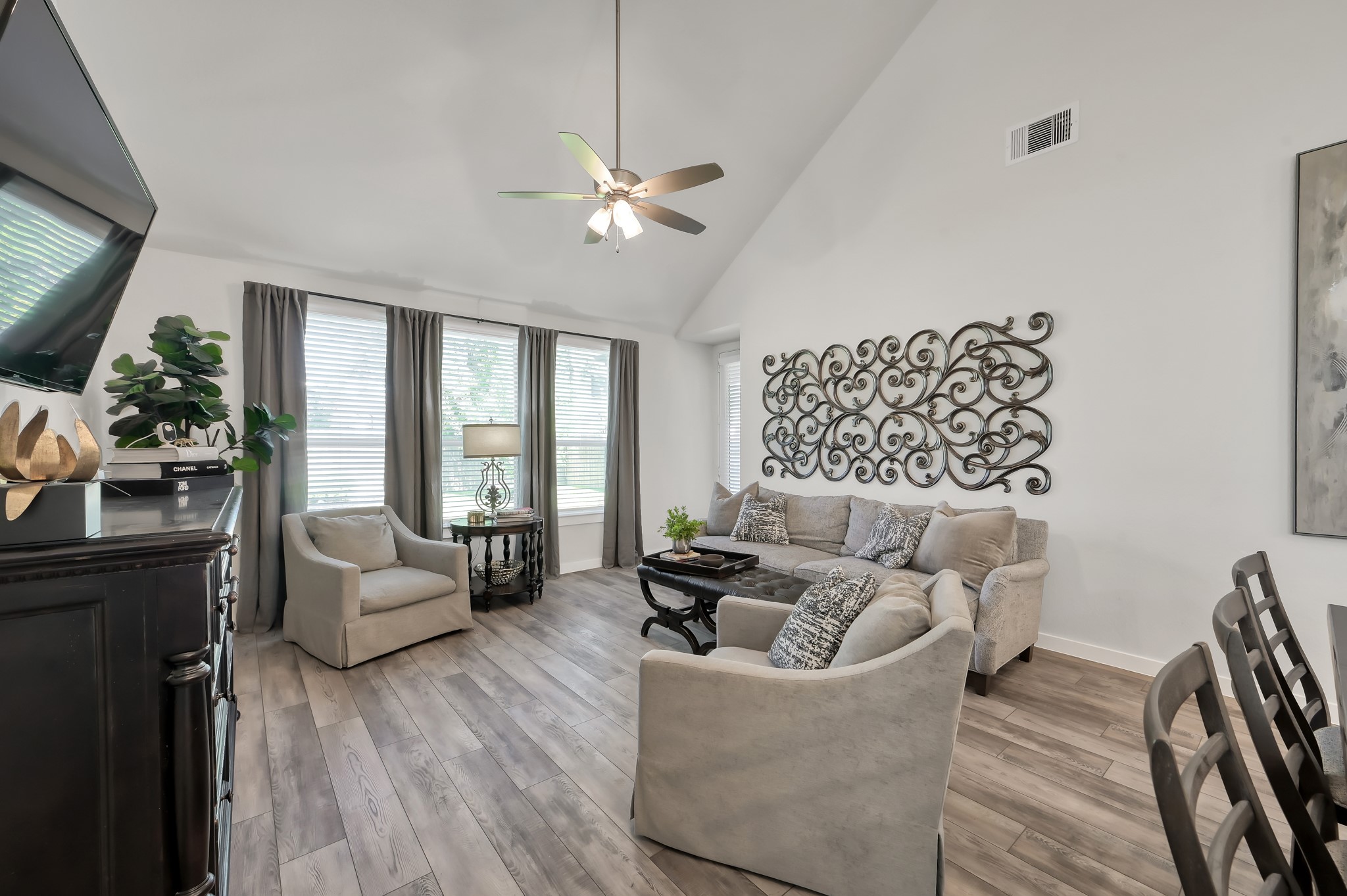 554 Timber Voyage Court Conroe, TX 77304 - Photo 11 of 35 a living room with furniture and wooden floor