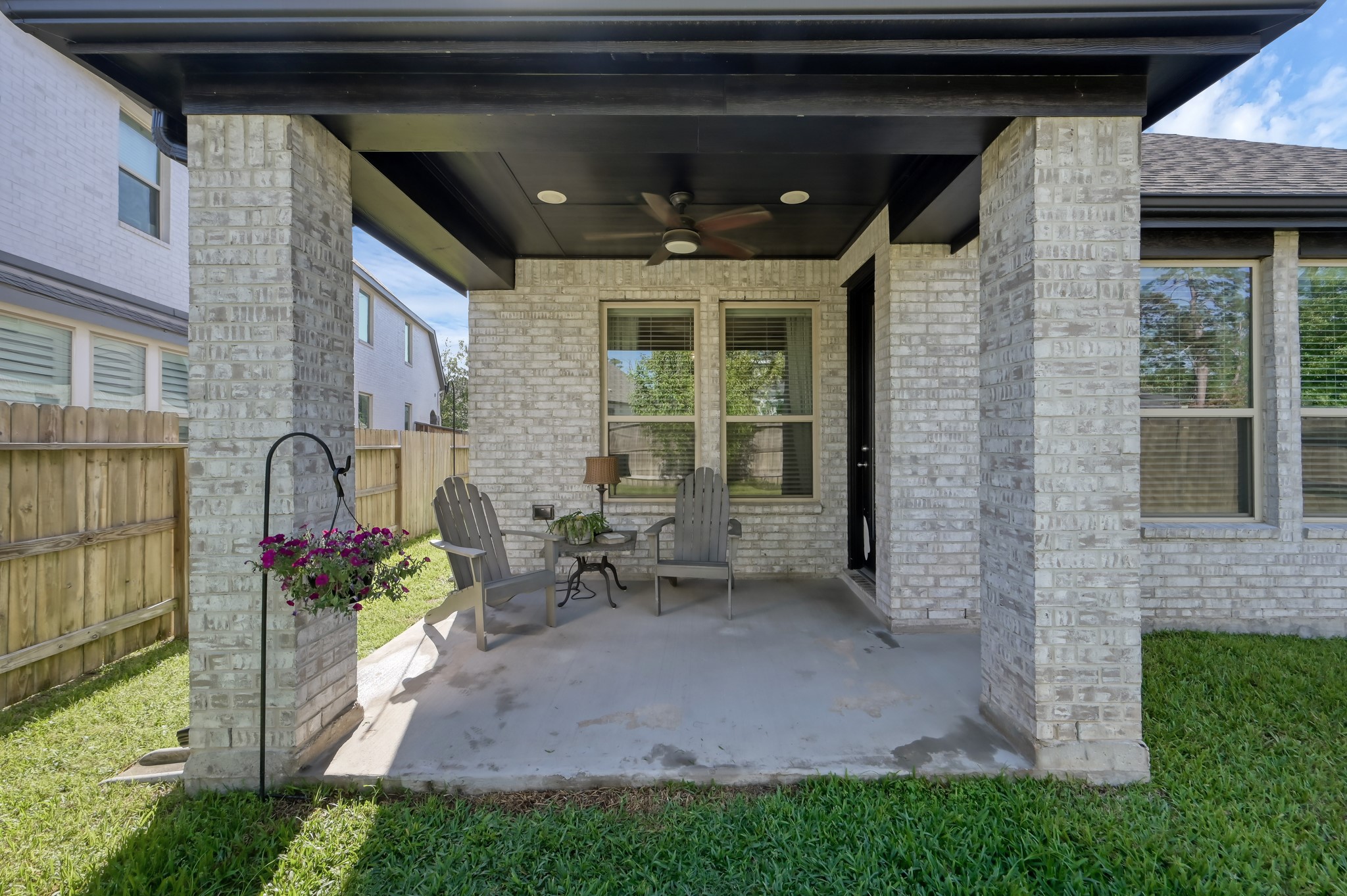 554 Timber Voyage Court Conroe, TX 77304 - Photo 25 of 35 a front view of a house with a garden