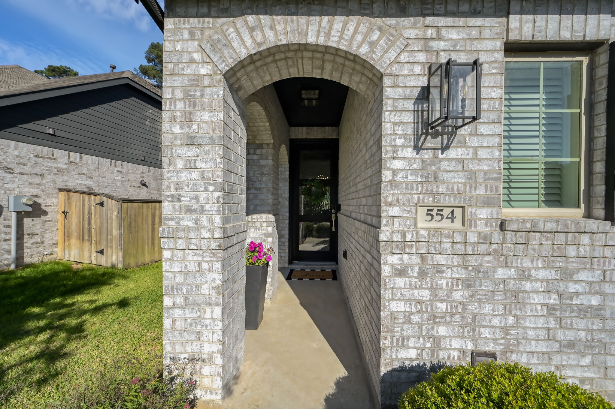 554 Timber Voyage Court Conroe, TX 77304 - Photo 3 of 35 a view of entryway with garden