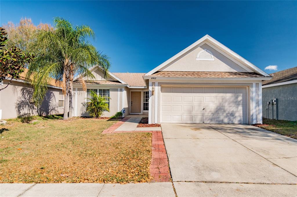 12412 Tree Pointe Court Riverview, FL 33578 - Photo 1 of 1 a view of a house with a yard