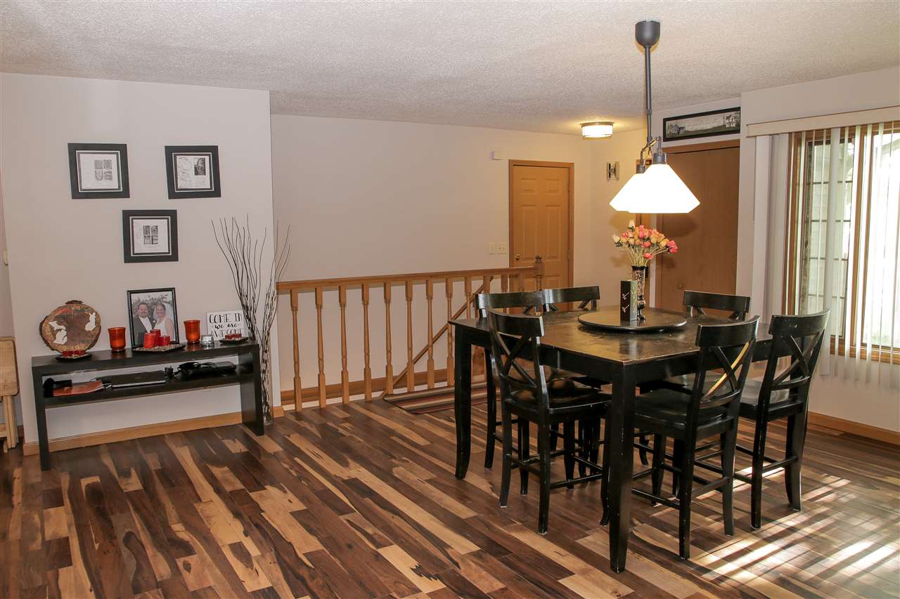 1078 South Gale Road Davison, MI 48423 - Photo 12 of 33 Beautiful Brazilian pecan flooring in the Dining Area.