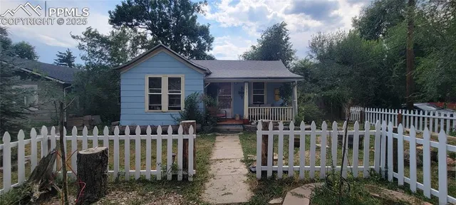 a house view with a garden