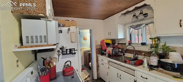 a view of storage and utility room