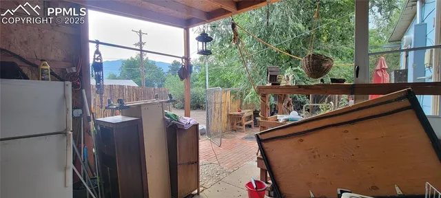 a view of balcony with furniture