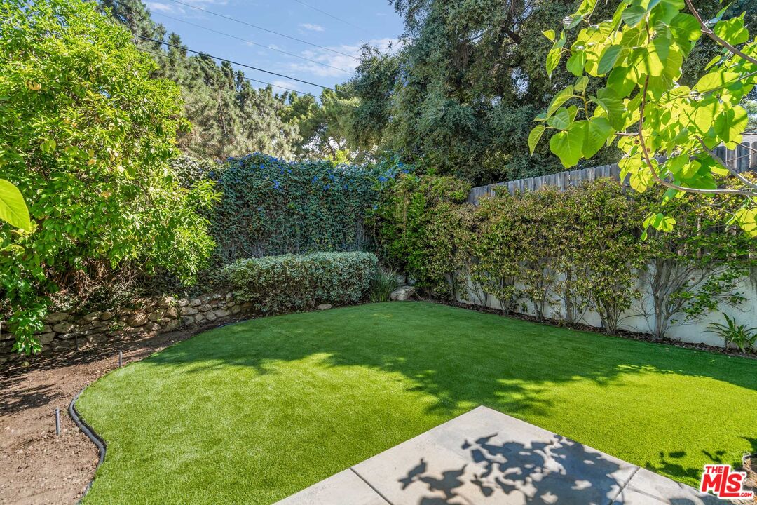 2409 Olive Avenue La Crescenta, CA 91214 - Photo 11 of 25 a view of a yard with plants and large trees