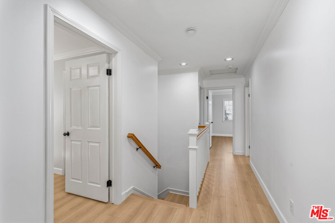 2409 Olive Avenue La Crescenta, CA 91214 - Photo 14 of 25 a view of a hallway with wooden floor and staircase
