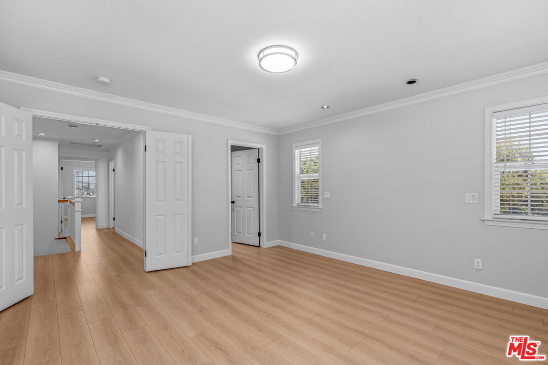 2409 Olive Avenue La Crescenta, CA 91214 - Photo 21 of 25 a view of an empty room with wooden floor and a window