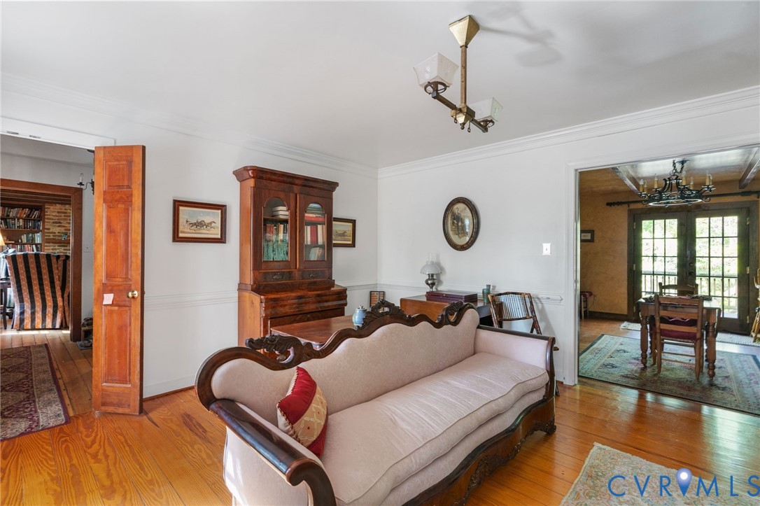 7381 McClellan Road Mechanicsville, VA 23111 - Photo 29 of 66 Hardwood flooring throughout, with white crown mol