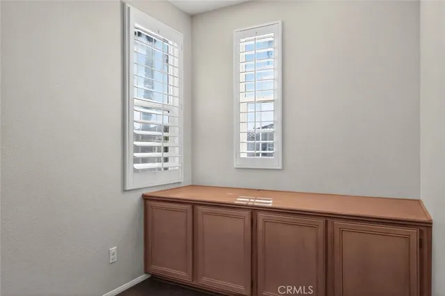 an empty room with windows