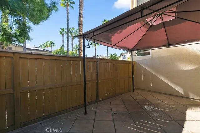a view of a balcony with an umbrella