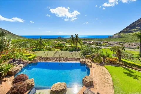 a view of a balcony with ocean view