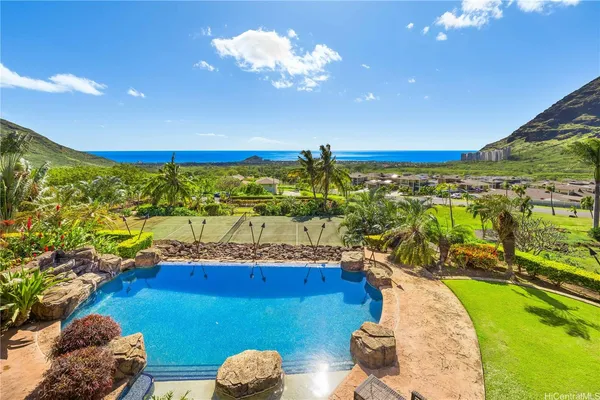 a view of a balcony with ocean view