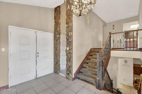 a view of an entryway with staircase