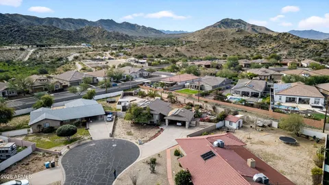 an aerial view of a city with lots of residential buildings