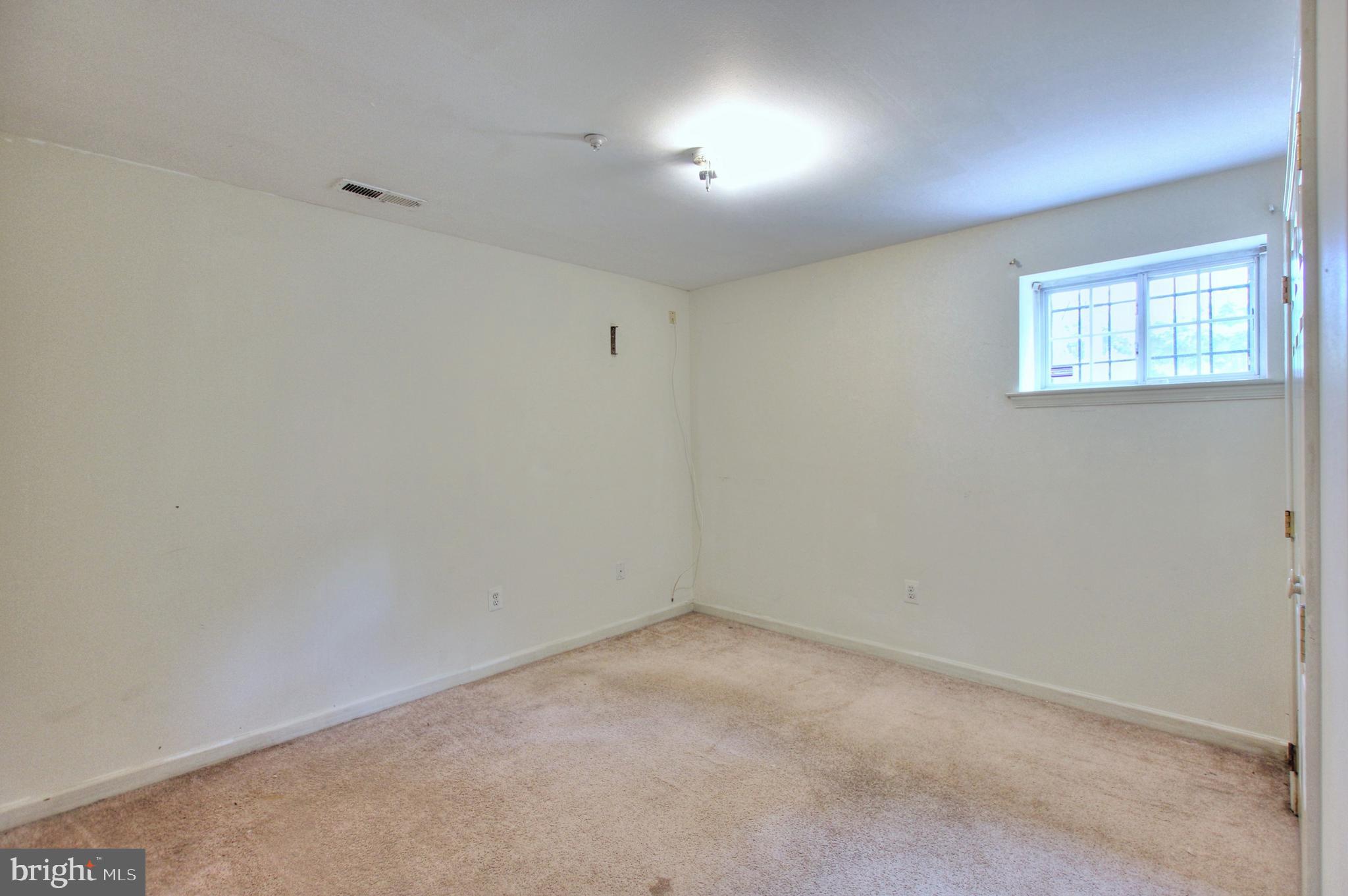 7706 Garrison Road Hyattsville, MD 20784 - Photo 32 of 36 Lower level bedroom