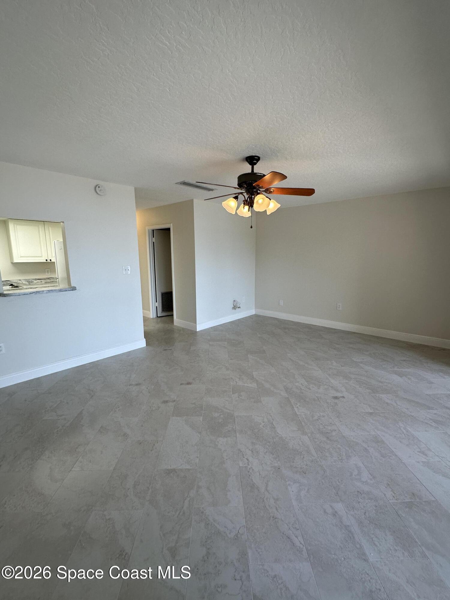 55 Riverside Drive, Unit 205 Cocoa, FL 32922 - Photo 7 of 17 20260227_171631708_iOS