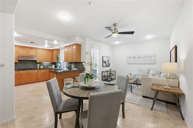 a view of a dining room with furniture