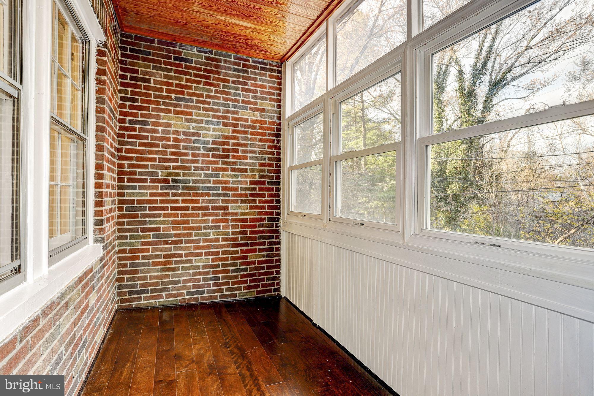 4638 Rokeby Road Baltimore, MD 21229 - Photo 14 of 28 Bright sunroom of the kitchen