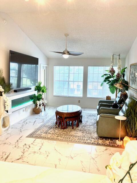 6315 La Costa Drive, Unit L Boca Raton, FL 33433 - Photo 19 of 43 Frieplace and 85 inch TV STAY