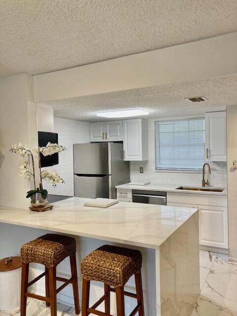 6315 La Costa Drive, Unit L Boca Raton, FL 33433 - Photo 4 of 43 Modern Gold fixtures