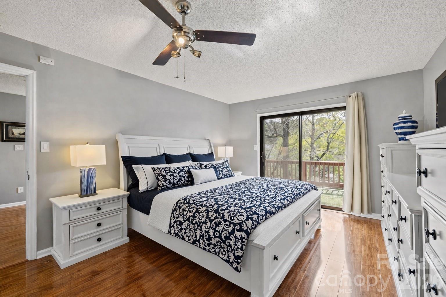 9067 Tulagi Court Fort Mill, SC 29708 - Photo 26 of 44 a bedroom with a large bed and a window