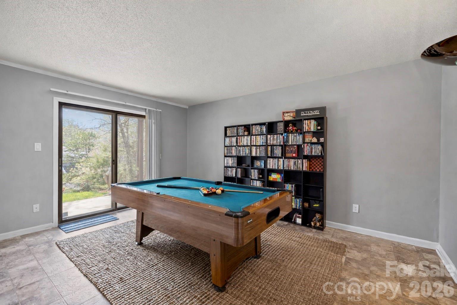 9067 Tulagi Court Fort Mill, SC 29708 - Photo 32 of 44 a room with furniture and large window