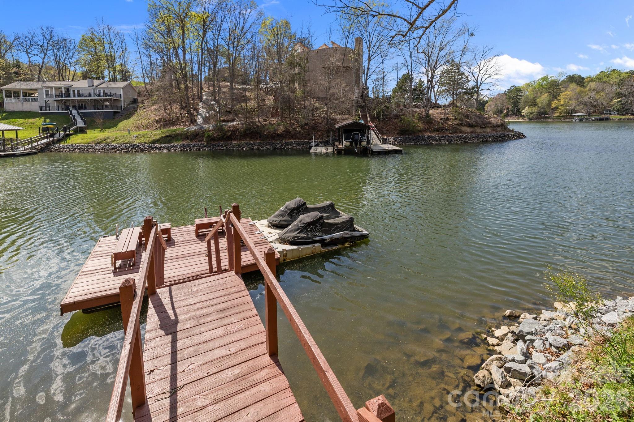 9067 Tulagi Court Fort Mill, SC 29708 - Photo 6 of 44 a view of a lake with sitting area