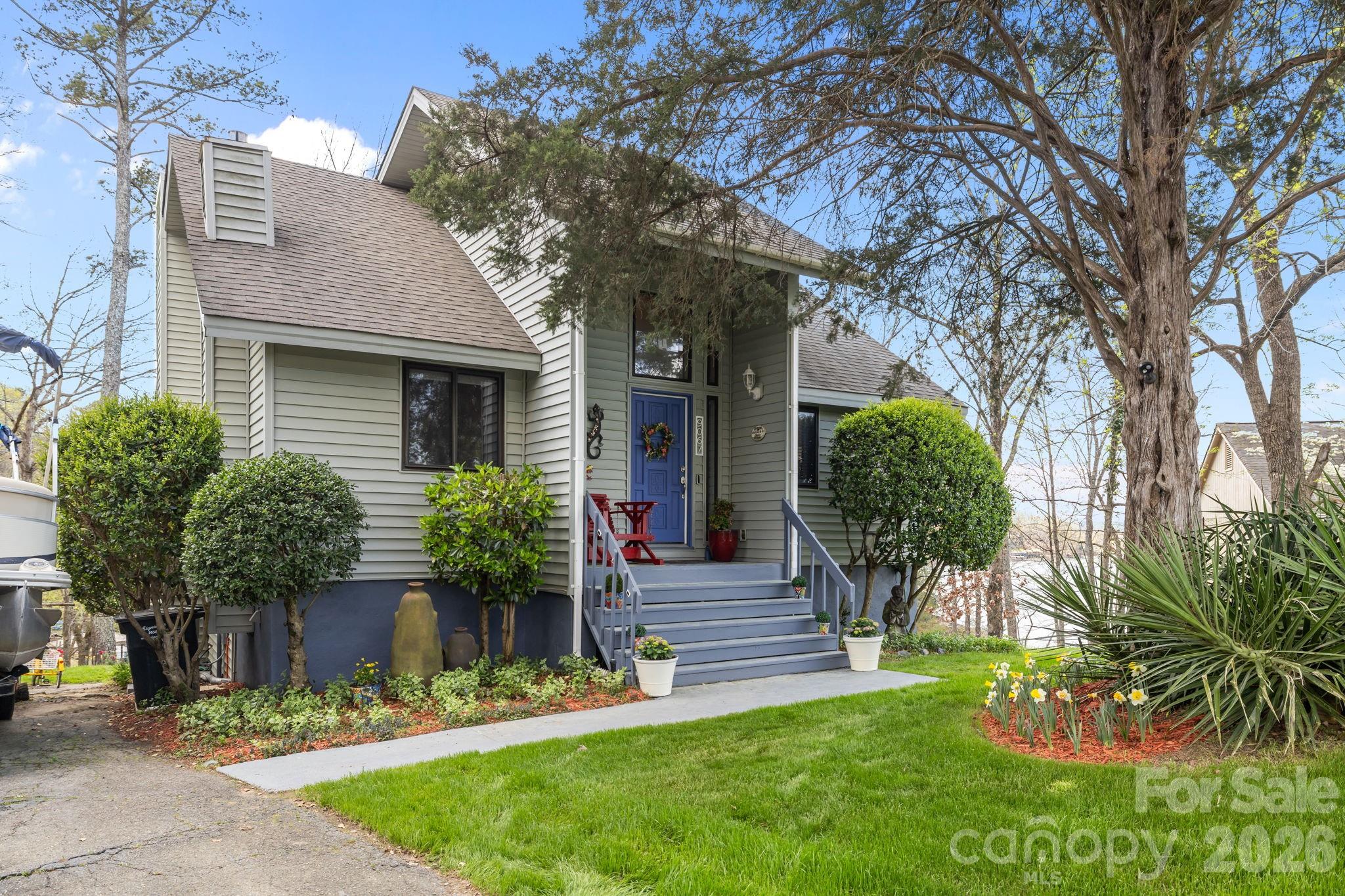 9067 Tulagi Court Fort Mill, SC 29708 - Photo 7 of 44 a front view of a house with garden