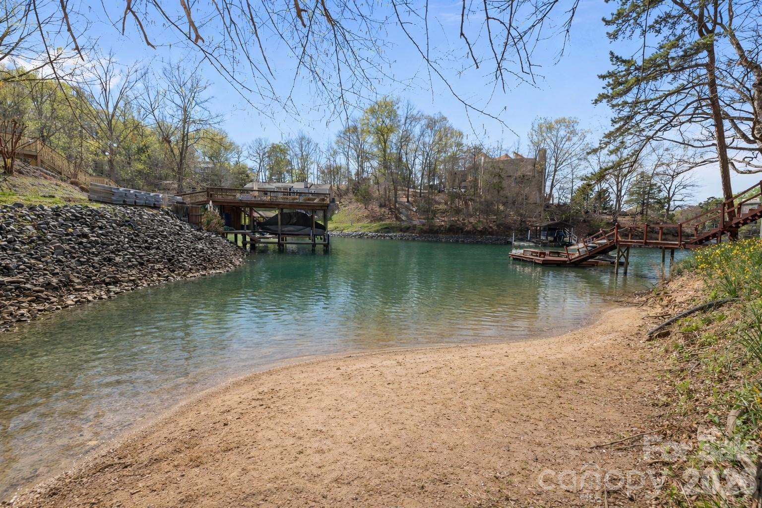 9067 Tulagi Court Fort Mill, SC 29708 - Photo 8 of 44 a view of a lake with a mountain