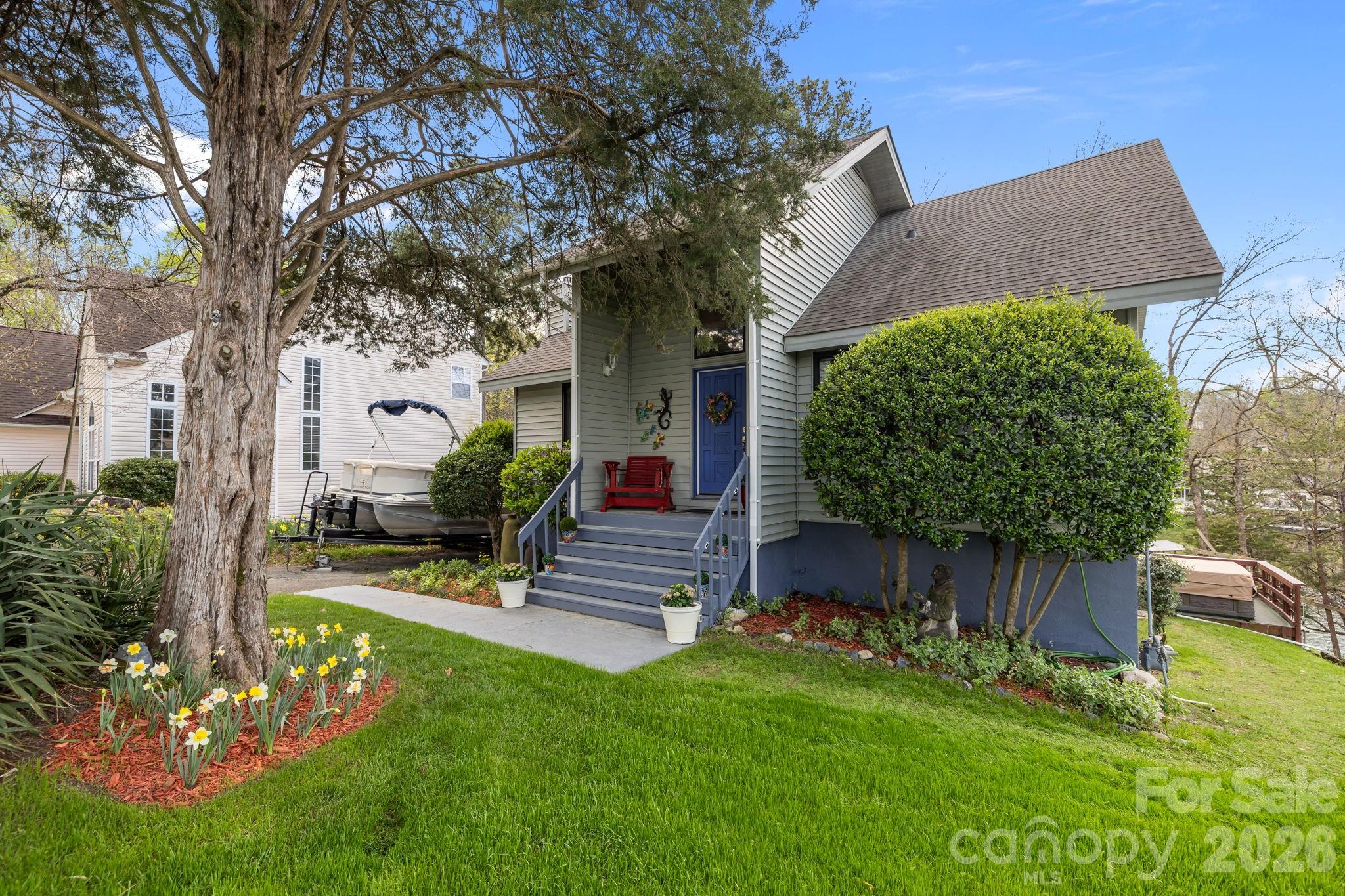 9067 Tulagi Court Fort Mill, SC 29708 - Photo 9 of 44 a view of backyard with plants and outdoor seating