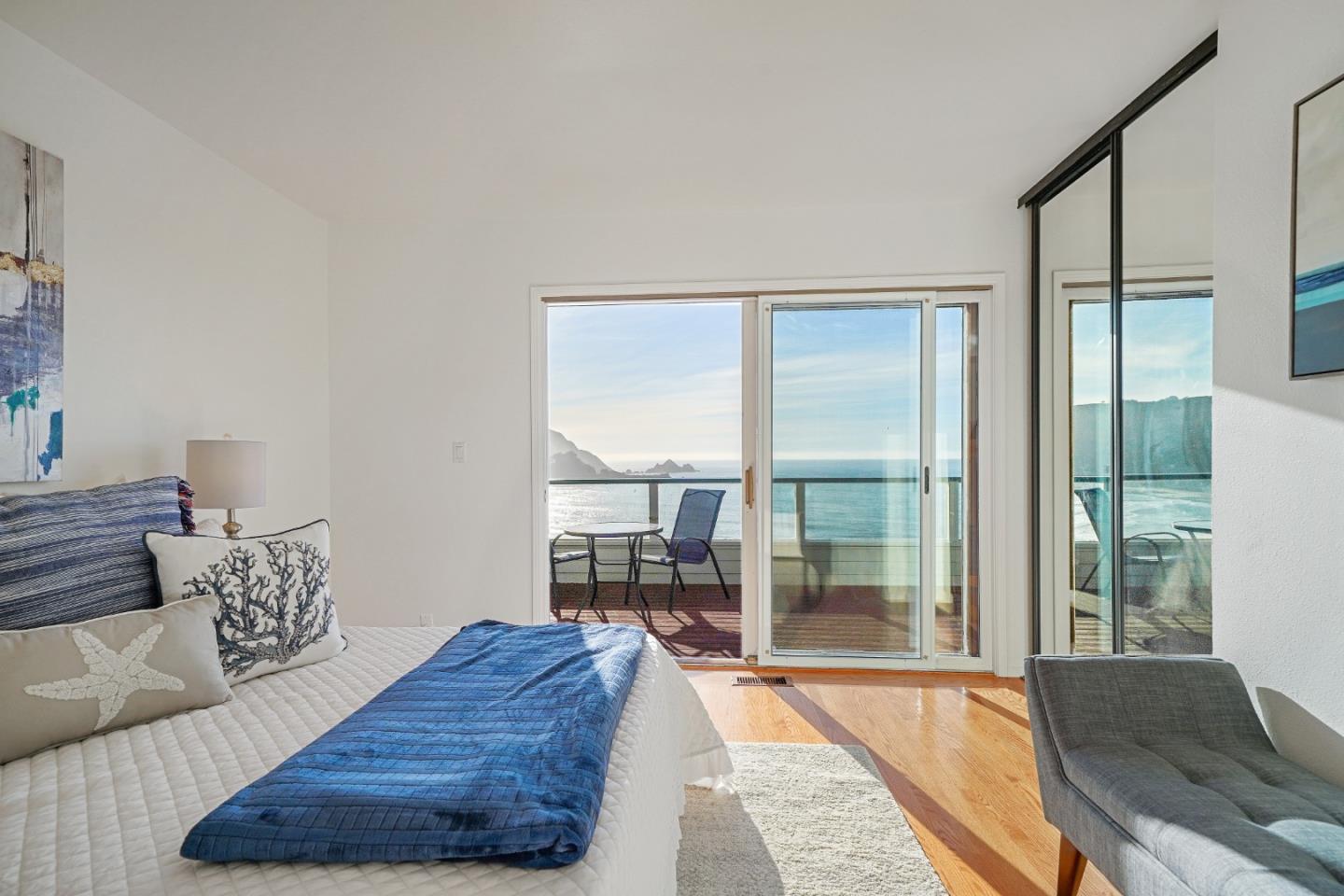 215 Roberts Road Pacifica, CA 94044 - Photo 16 of 40 a living room with furniture and a large window
