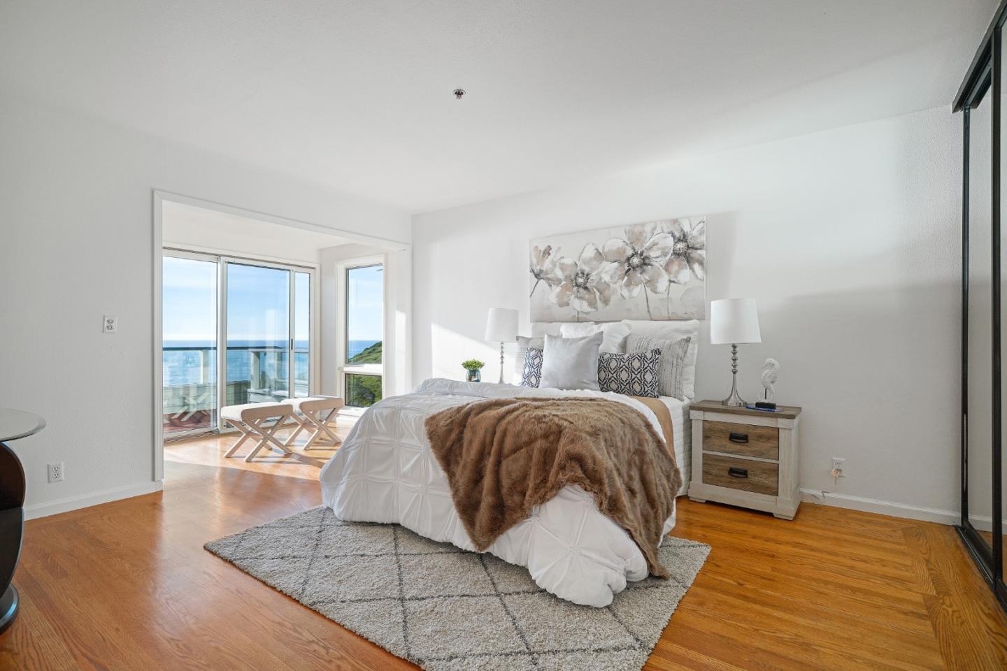 215 Roberts Road Pacifica, CA 94044 - Photo 19 of 40 a bed room with a bed and a couch