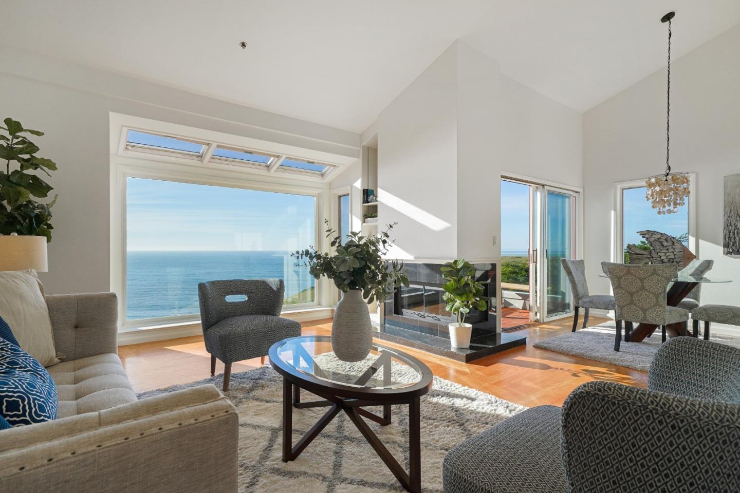 215 Roberts Road Pacifica, CA 94044 - Photo 2 of 40 a living room with furniture and wooden floor