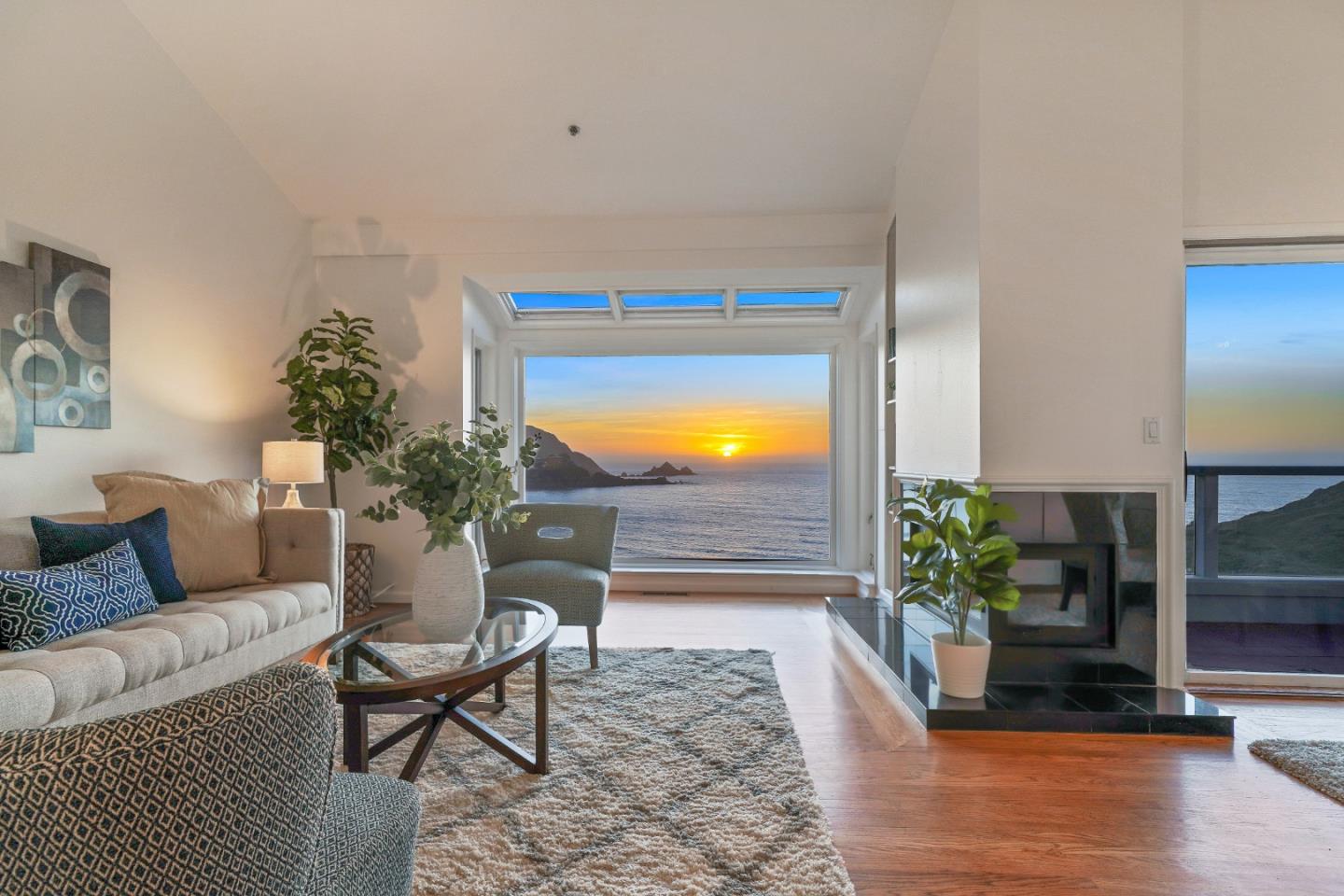 215 Roberts Road Pacifica, CA 94044 - Photo 31 of 40 a living room with furniture and a potted plant