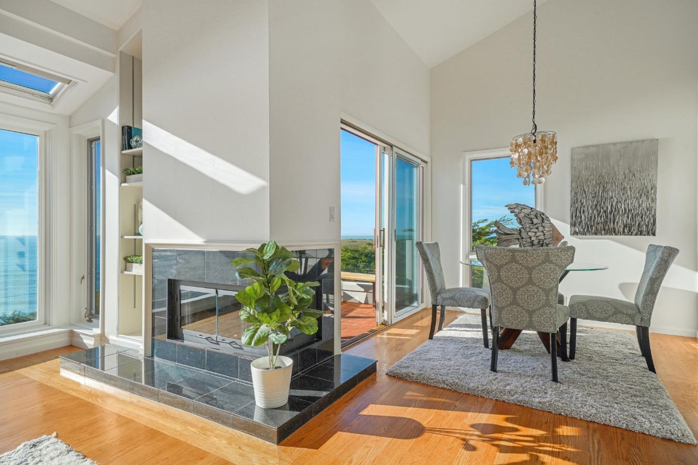215 Roberts Road Pacifica, CA 94044 - Photo 7 of 40 a living room with furniture and a potted plant
