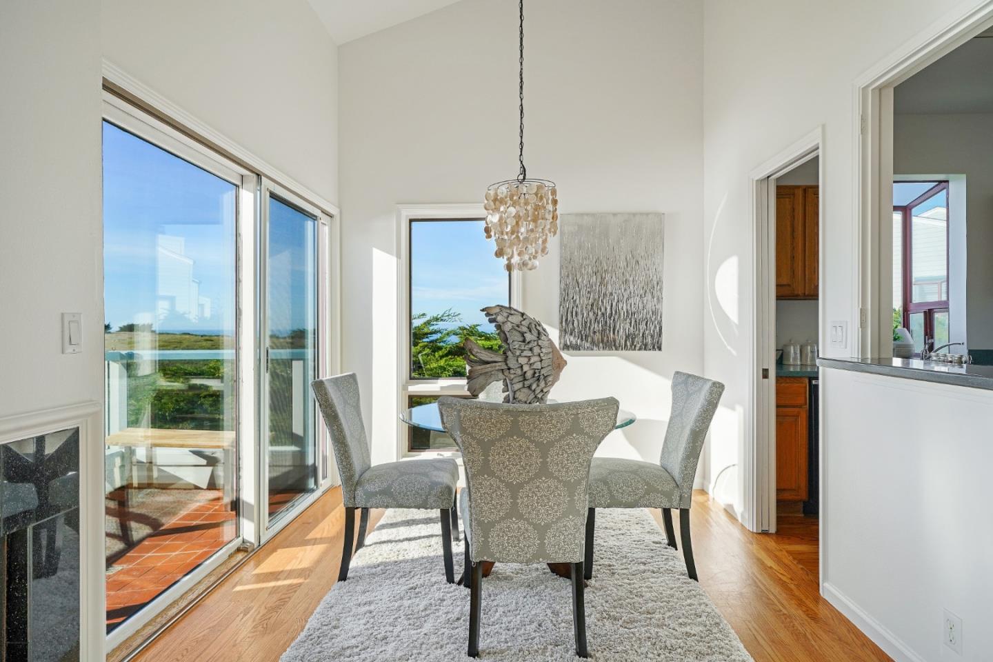215 Roberts Road Pacifica, CA 94044 - Photo 8 of 40 a view of a dining room with furniture window and wooden floor