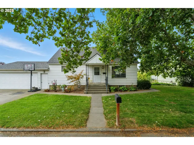 a house view with a garden space