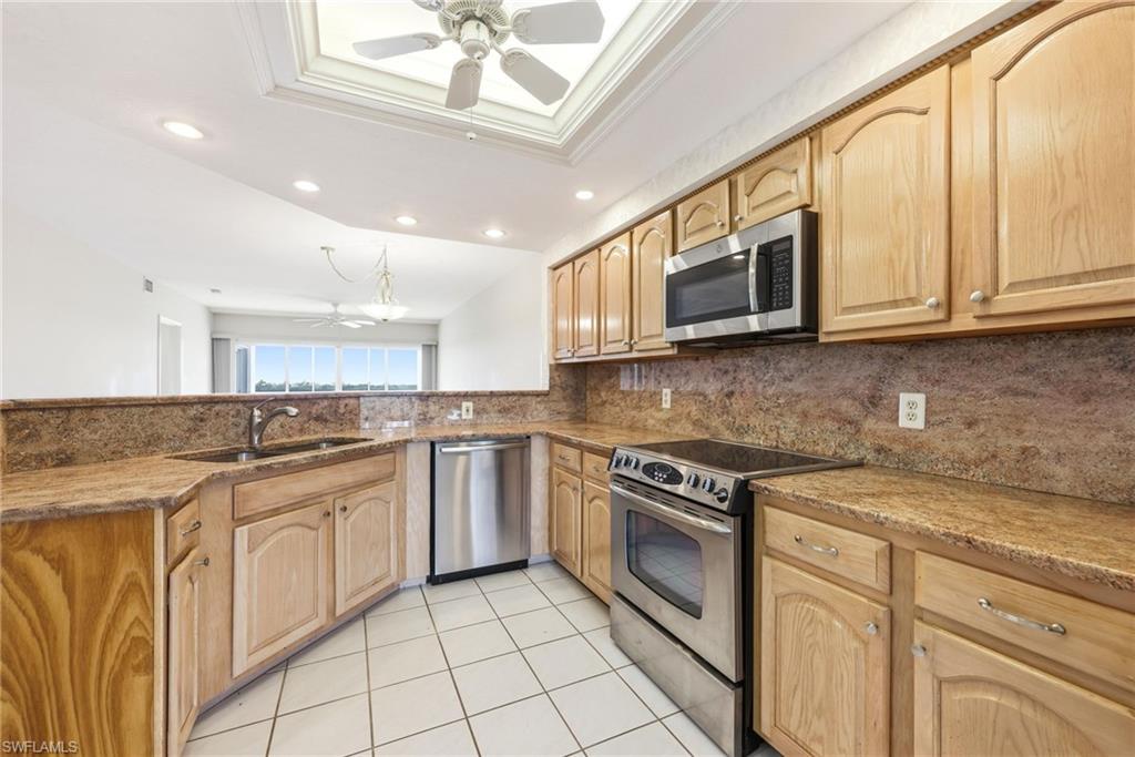 13105 Vanderbilt Drive, Unit 407 Naples, FL 34110 - Photo 3 of 38