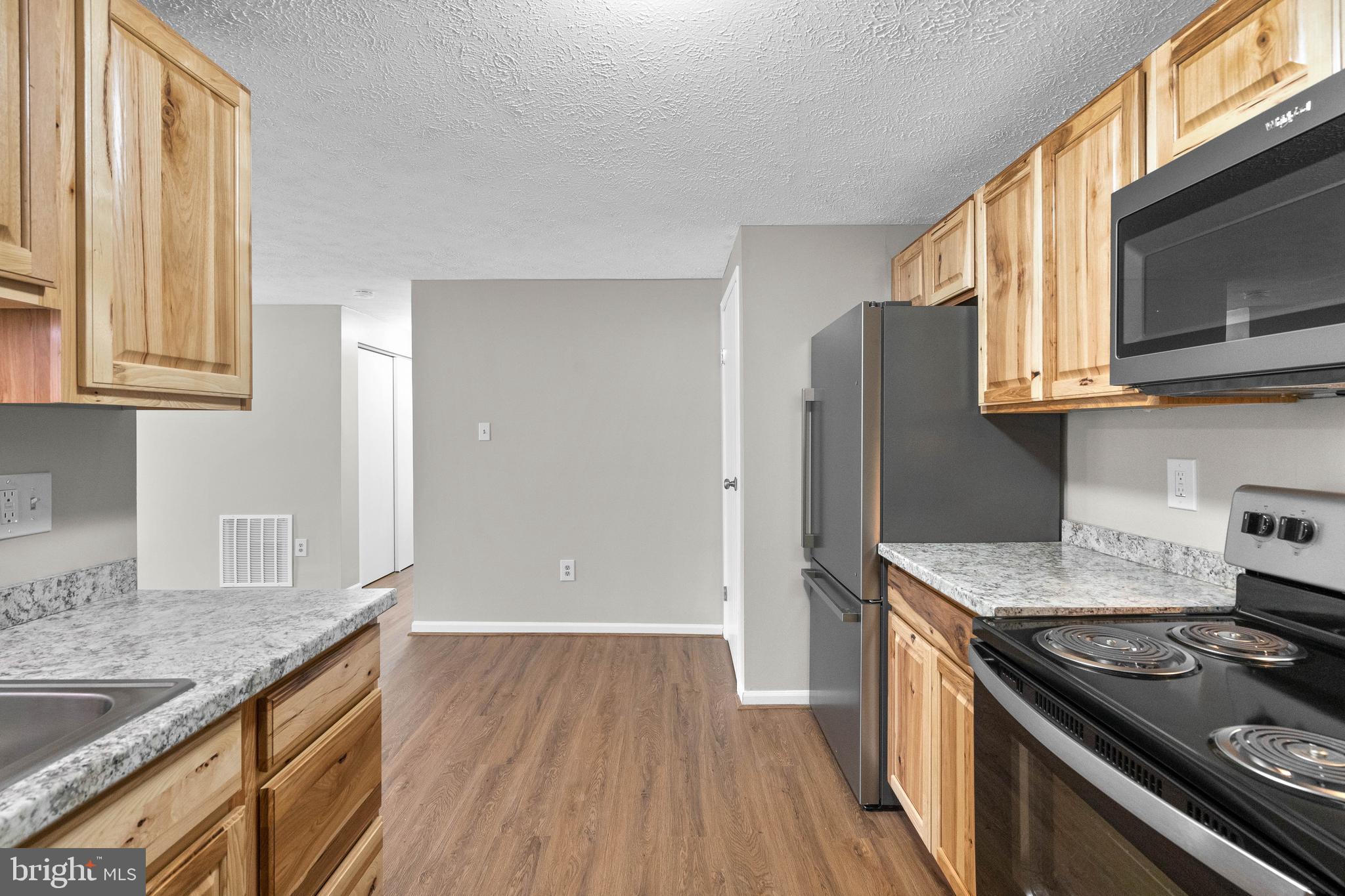 3925 Greencastle Road, Unit 103 Burtonsville, MD 20866 - Photo 11 of 24 Kitchen