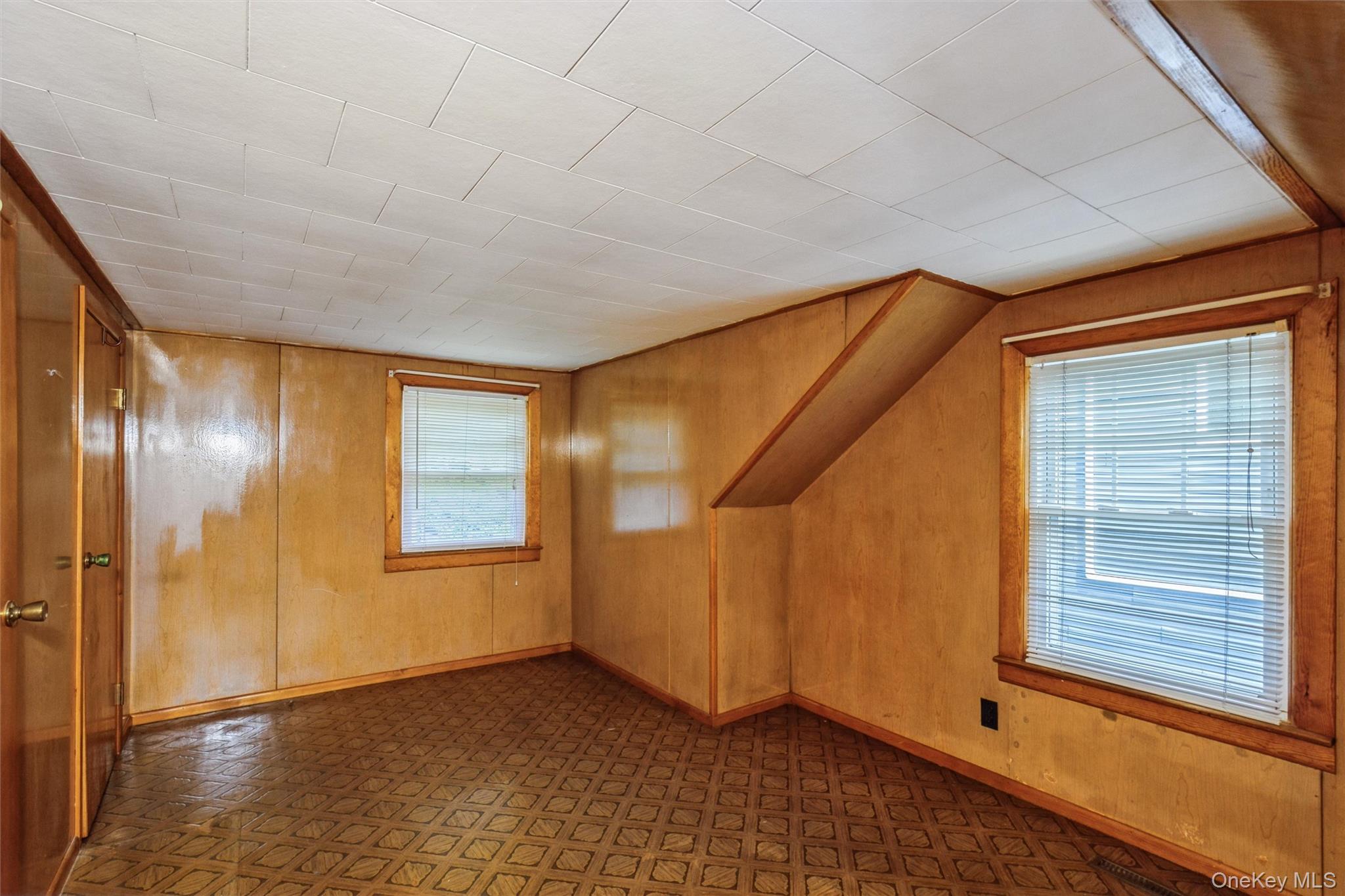 10 Laurel Road Ronkonkoma, NY 11779 - Photo 15 of 21 a view of an empty room with a window