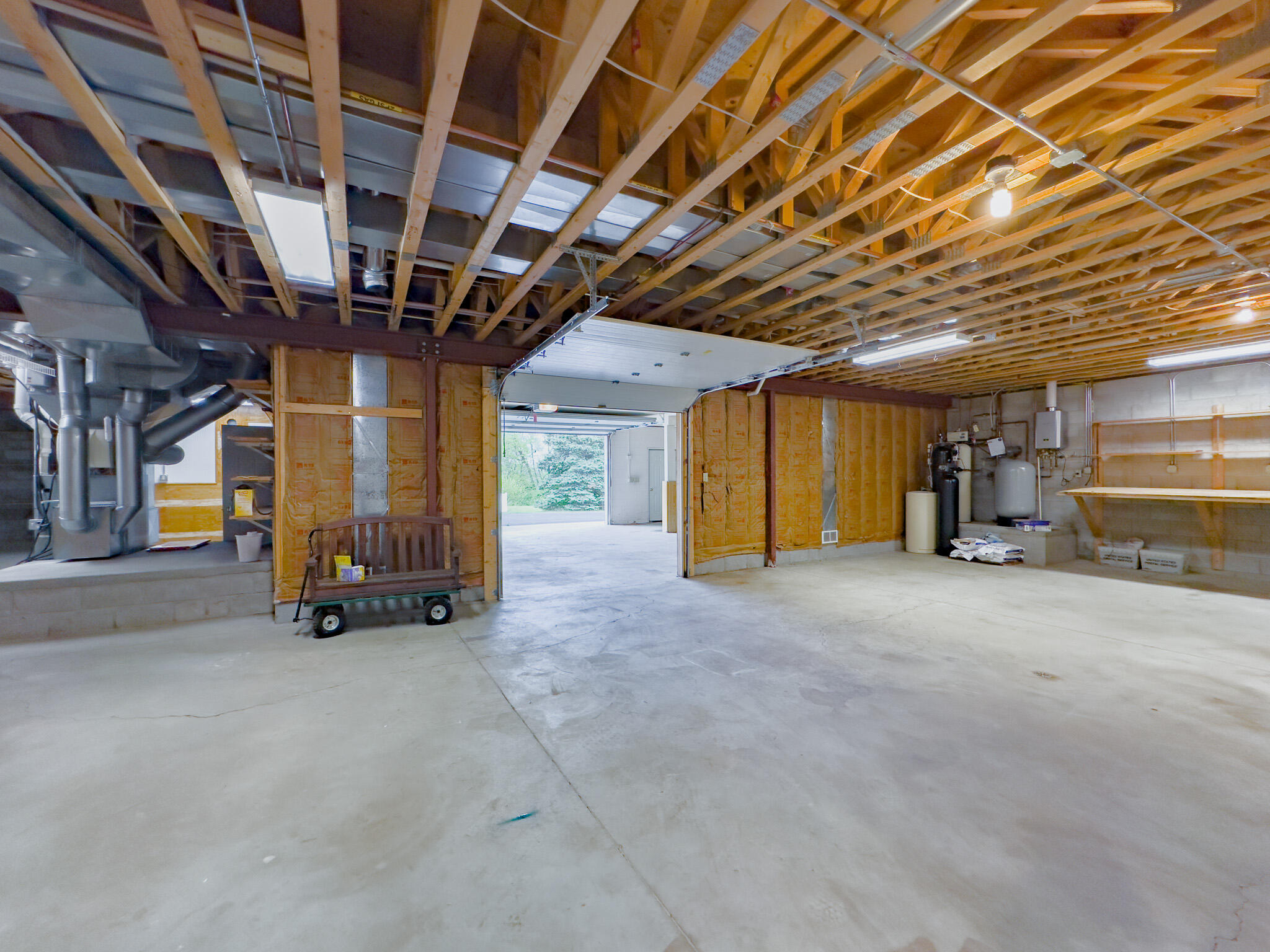 11604 North Granville Road Mequon, WI 53097 - Photo 45 of 49 Overhead door opens to attached 2.5 car garage. Makes it convenient for storage of lawn mower, snow blower, bikes etc.
