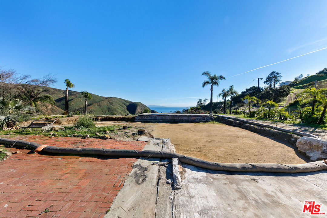 2700 Hume Road Malibu, CA 90265 - Photo 3 of 16 a view of swimming pool from a lake