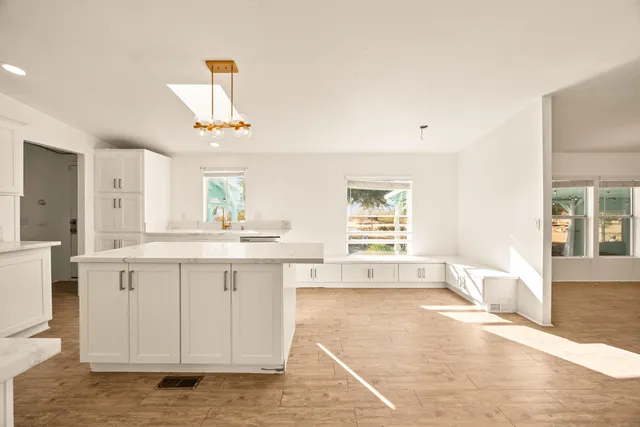 a view of small space with wooden floor